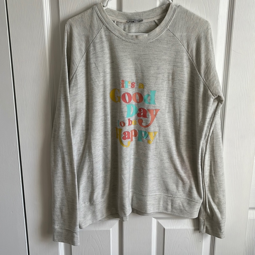 Super soft crewneck sweater with happy graphic